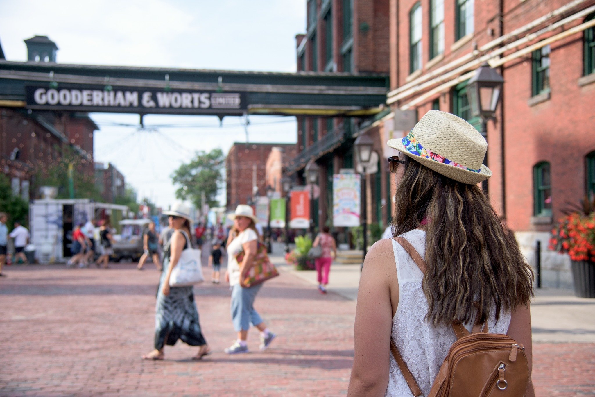 Historic Distillery District with cobblestone streets and red-brick buildings