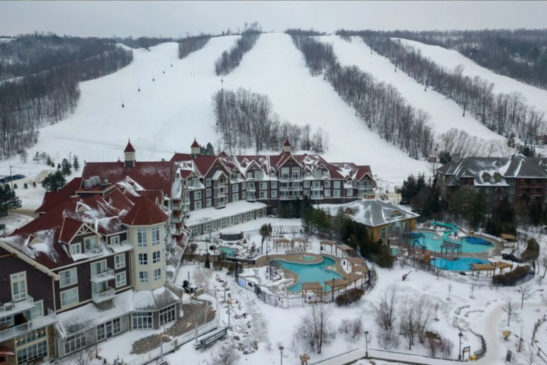Aerial view of Blue Mountain Village and ski slopes in winter