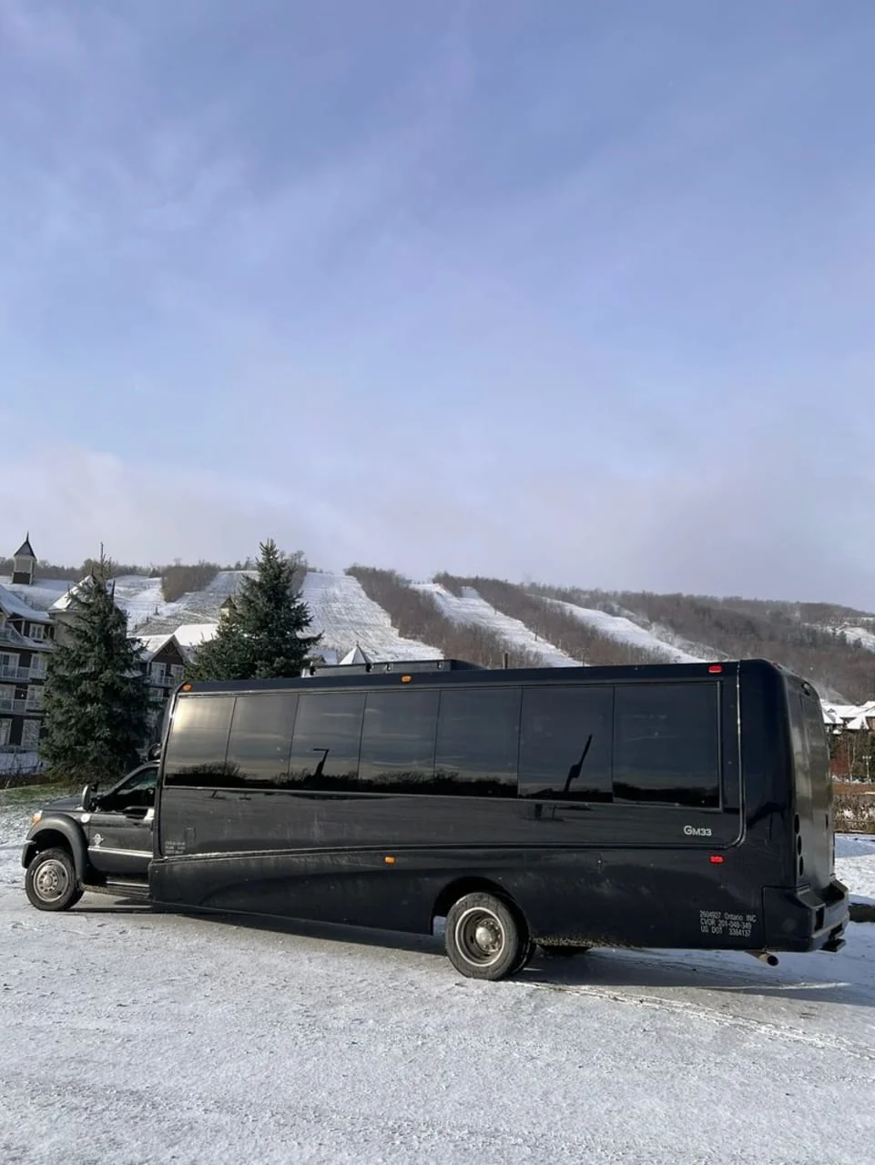 Gray Line shuttle bus parked at Blue Mountain Village