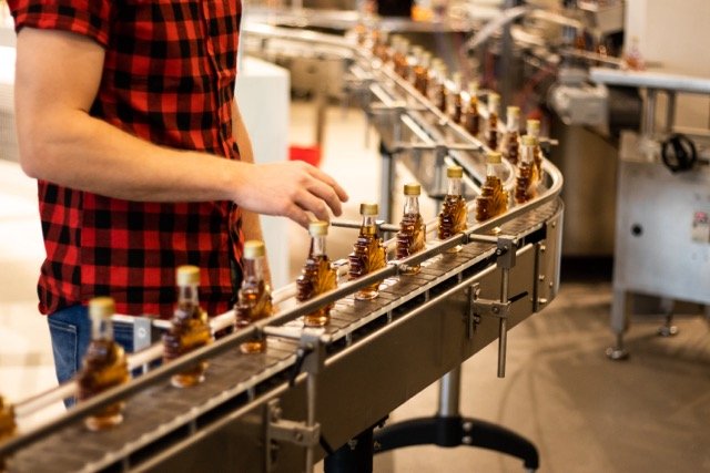 Maple syrup bottling line production process at Canadian facility