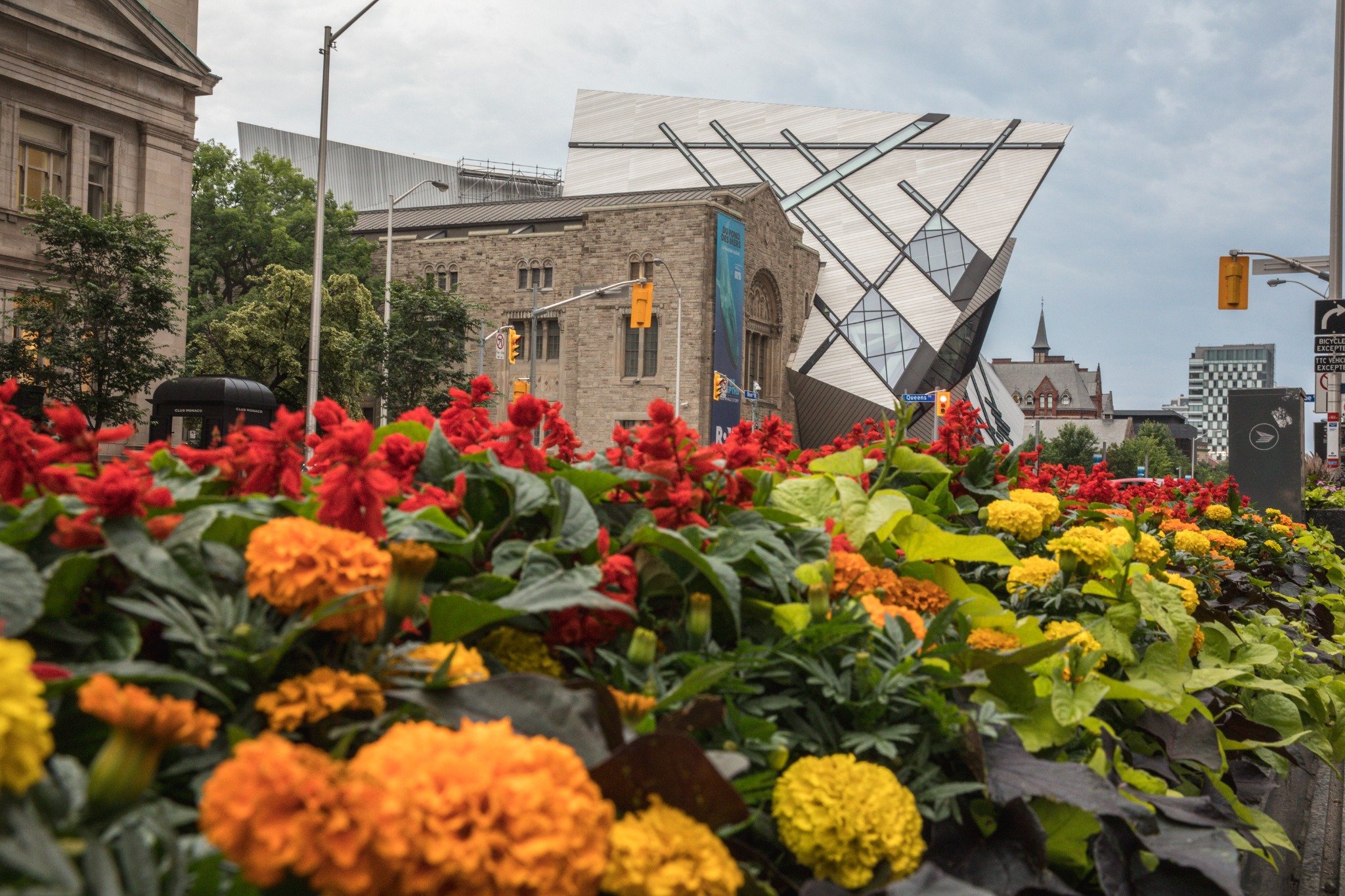 Royal Ontario Museum with the Crystal architecture and flower garden