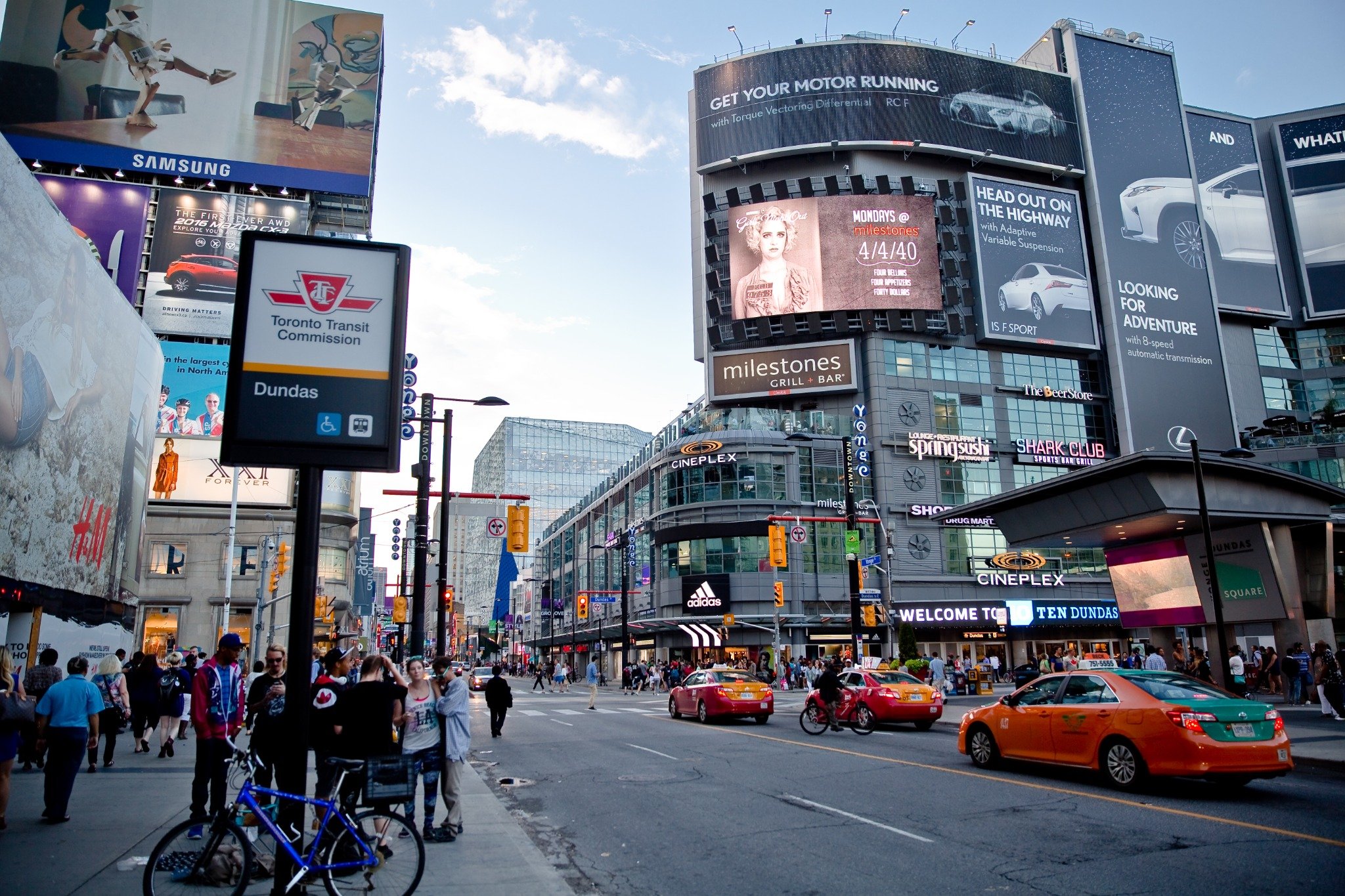 Yonge-Dundas Square at night with bright city lights and billboards